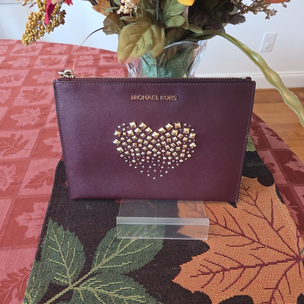 Michael Kors Plum Clutch with Gold Heart Accents - Picture 1 of 6